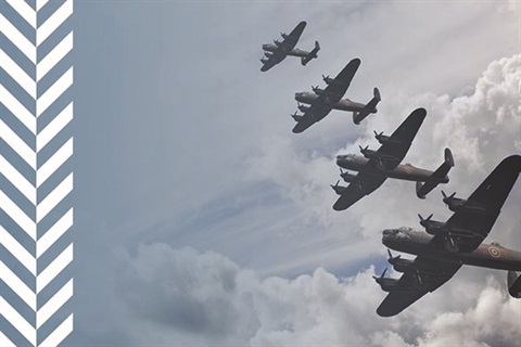 Line of bombers flying in the sky.