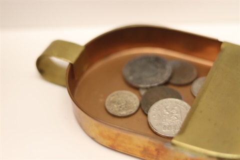 Image of Centenbakkie organ with collection tin.